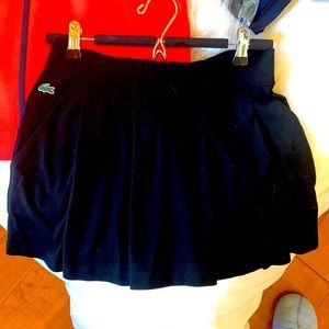 A mini pleated Lacoste tennis skirt in XS (36 Lacoste)